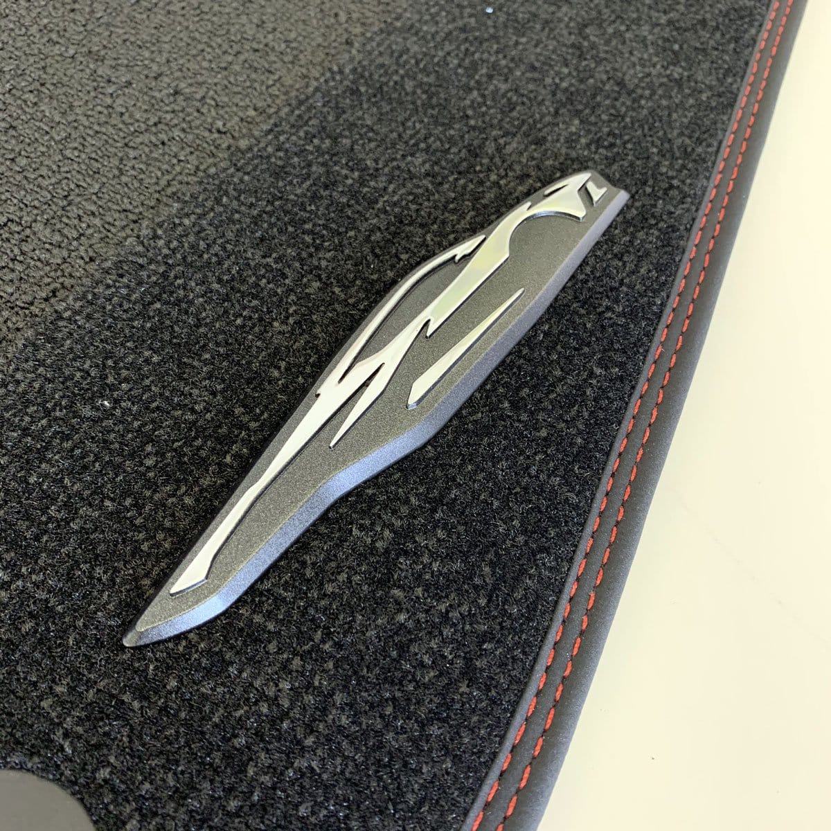 C8 Corvette Carpeted Floor Mats with Corvette Silhouette in Black, Red, or Gray Stitching - SKU 50-4-029.