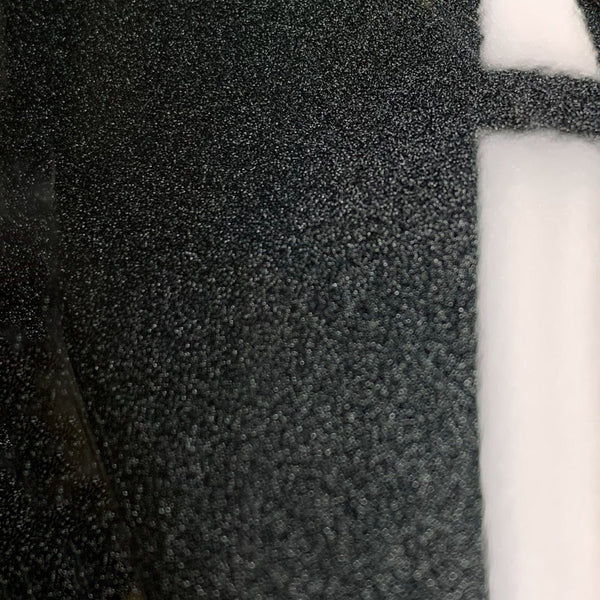 A paint swatch of Carbon Flash Metallic Black