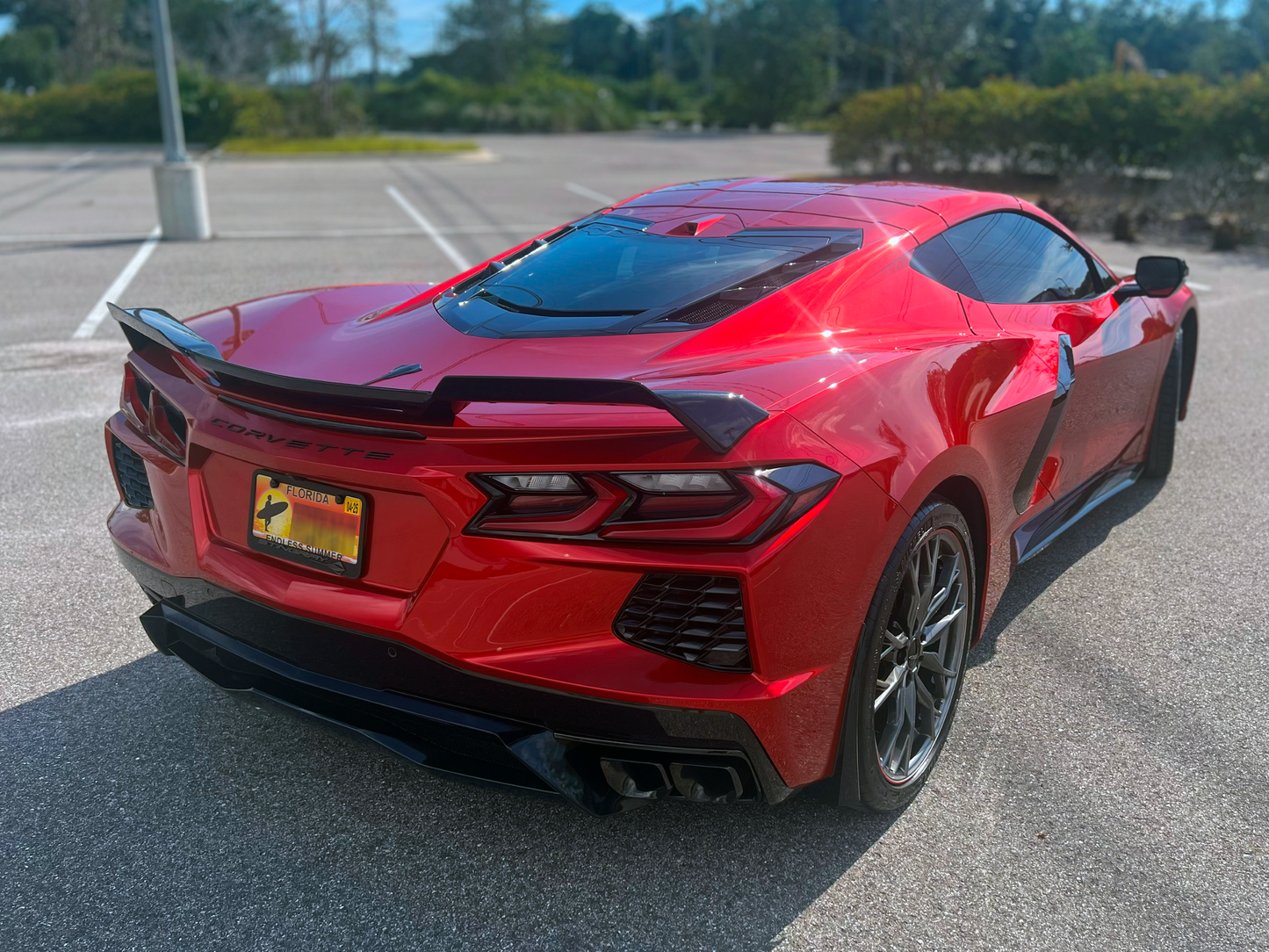 The Red Ray 23 C8 s 2023 Corvette Stingray 2LT in red-mist-metallic-tintcoat