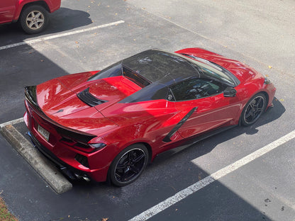 Charles girl Ravens 2023 Corvette Stingray 2LT in red-mist-metallic-tintcoat