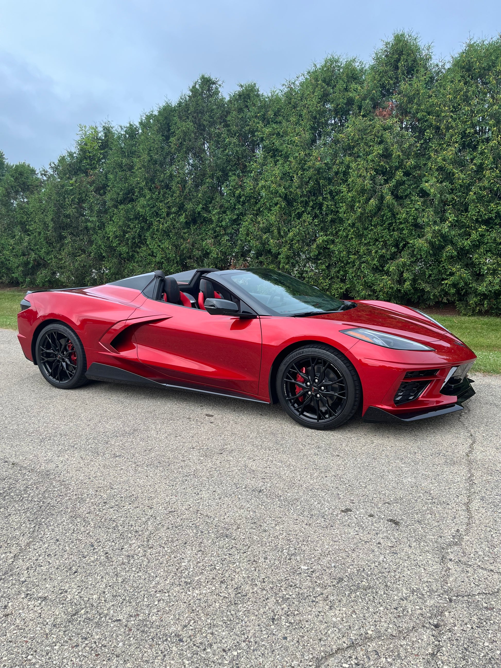 Wally Riels 2024 Corvette Stingray 2LT in red-mist-metallic-tintcoat