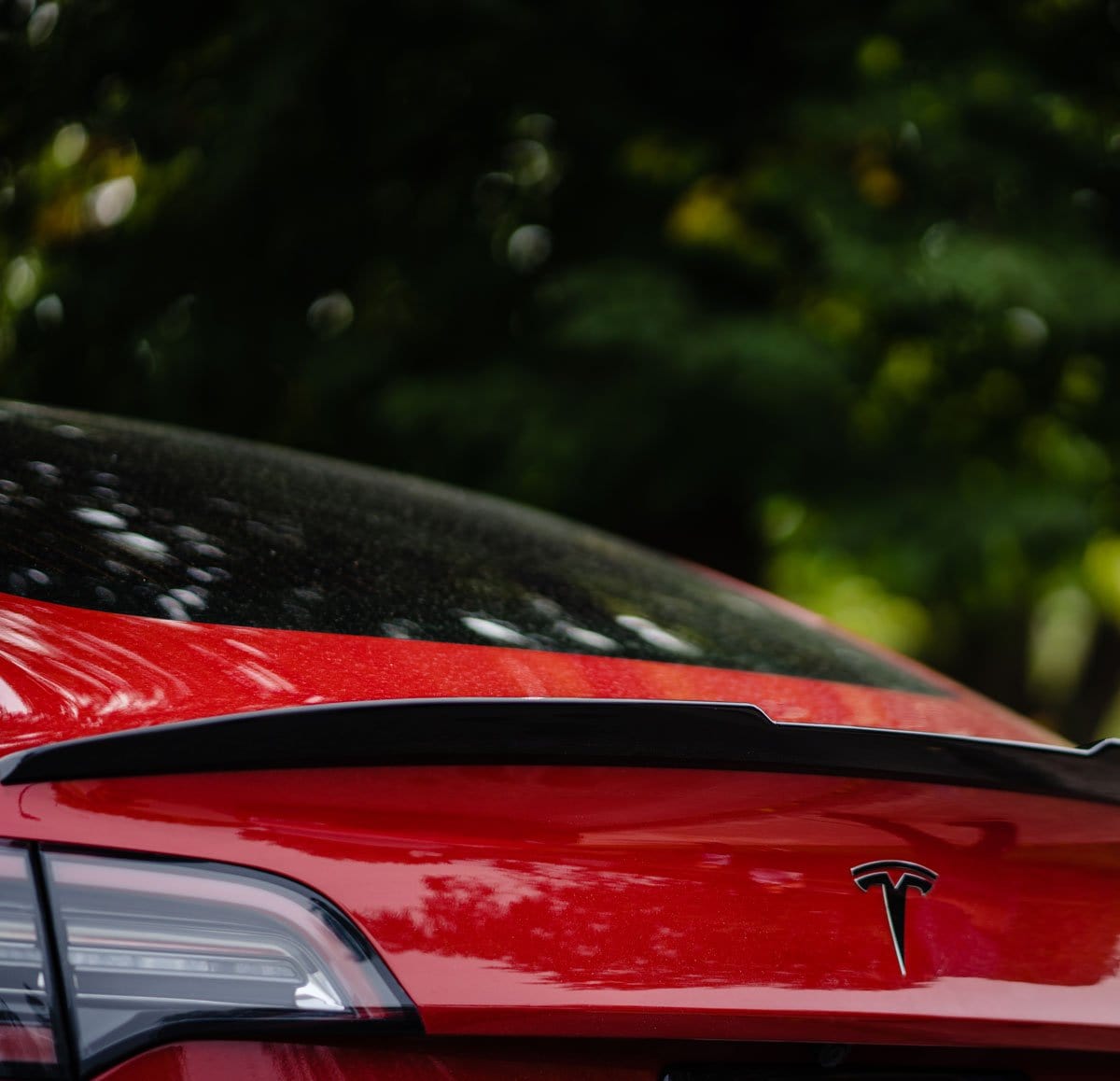 ACS Composite M3 Spoiler for Tesla Model 3, Gloss Black finish, SKU 51-4-001, rear view of spoiler on car trunk.