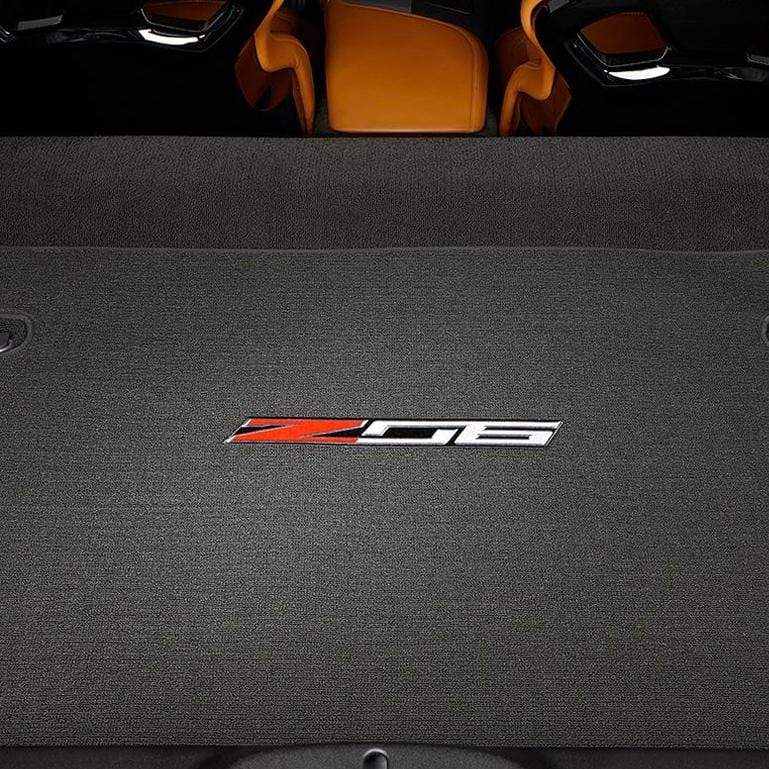 Premium carpeted Z06 Trunk Mats with embroidered logo for C7 Corvette Z06 coupe models. SKU 45-4-228. Protect your cargo area today!