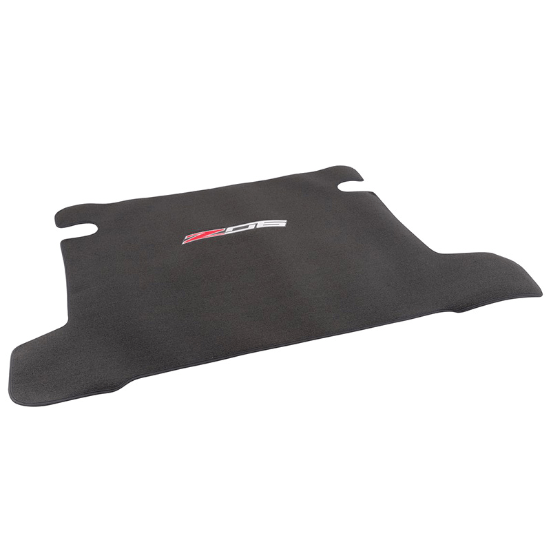Premium carpeted Z06 Trunk Mat with embroidered logo for C7 Corvette Z06 coupe models. SKU 45-4-228. Protect your cargo area now!